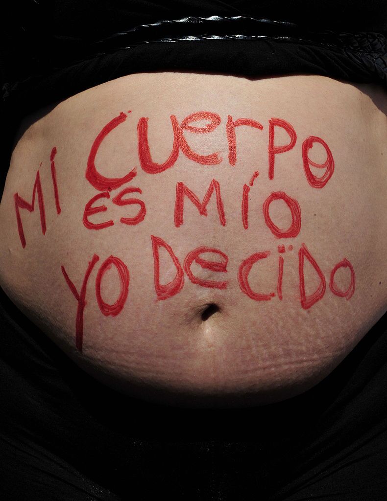 The Strange Hopefulness of Growing a Human While the World Burns