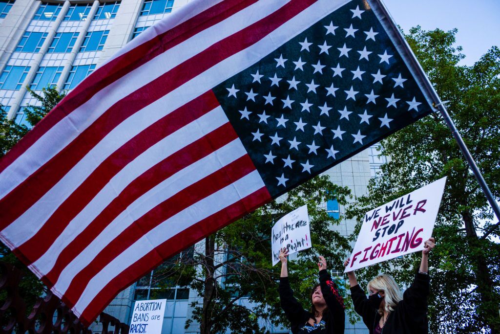 An upside down American flag during Scotus protest